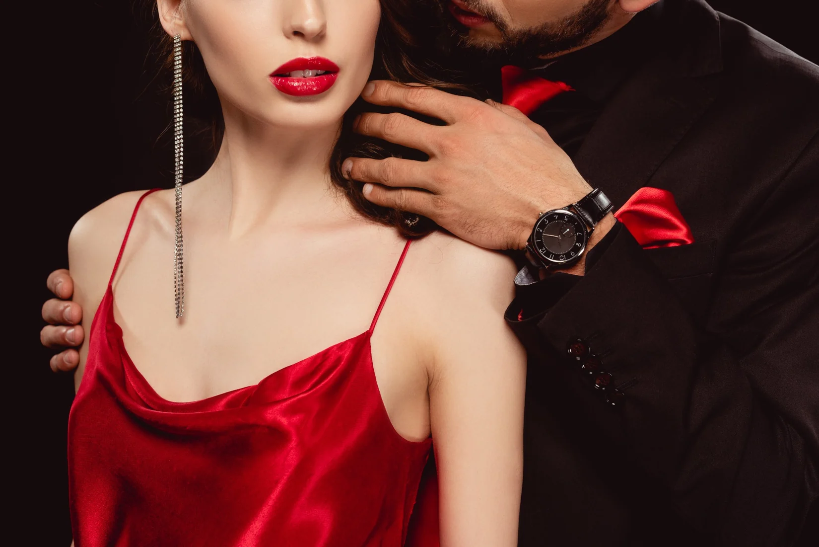 Couple in an elegant red and black setting
